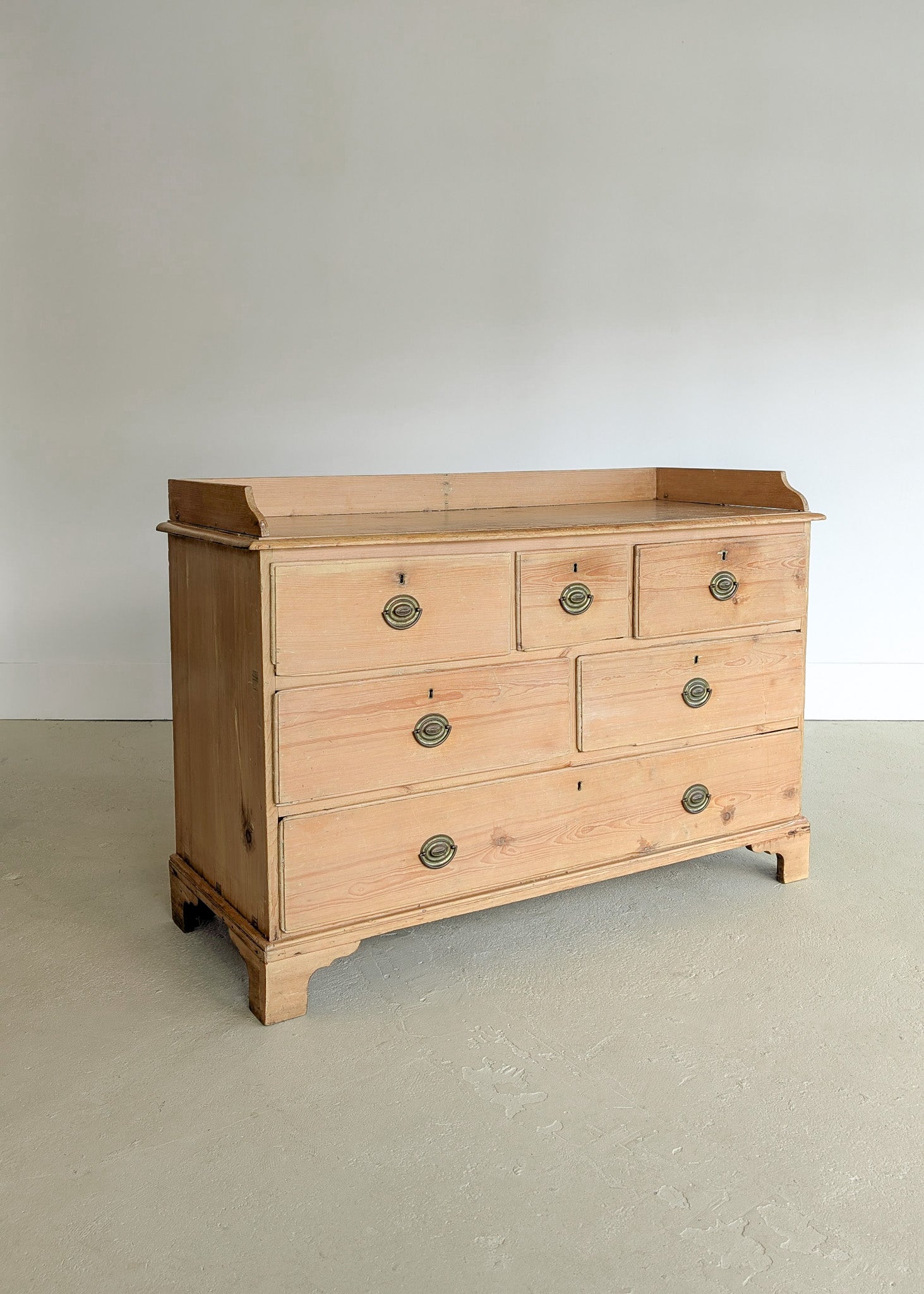 Wide Antique English Pine Chest of Drawers with Trim Top
