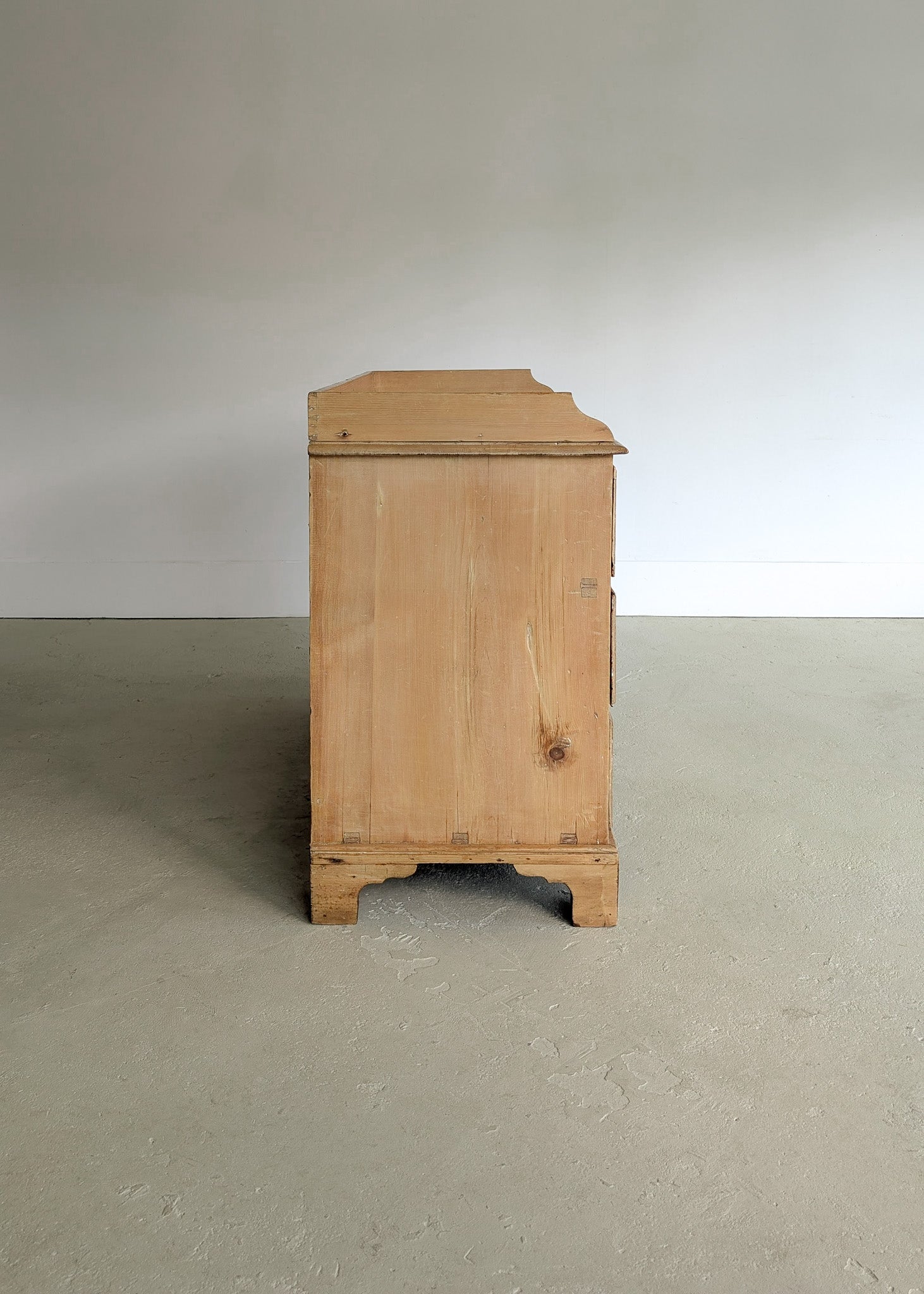 Wide Antique English Pine Chest of Drawers with Trim Top