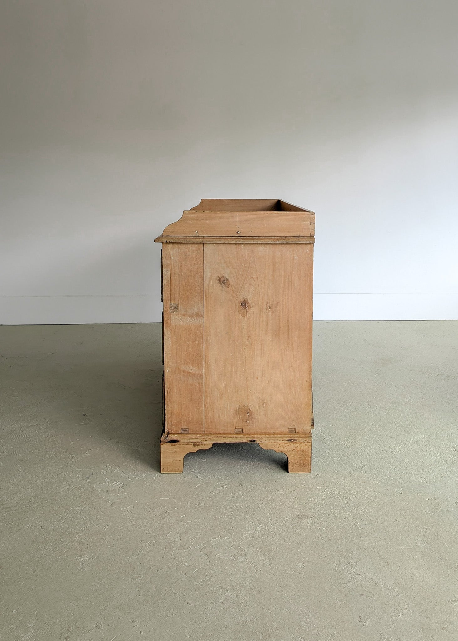 Wide Antique English Pine Chest of Drawers with Trim Top
