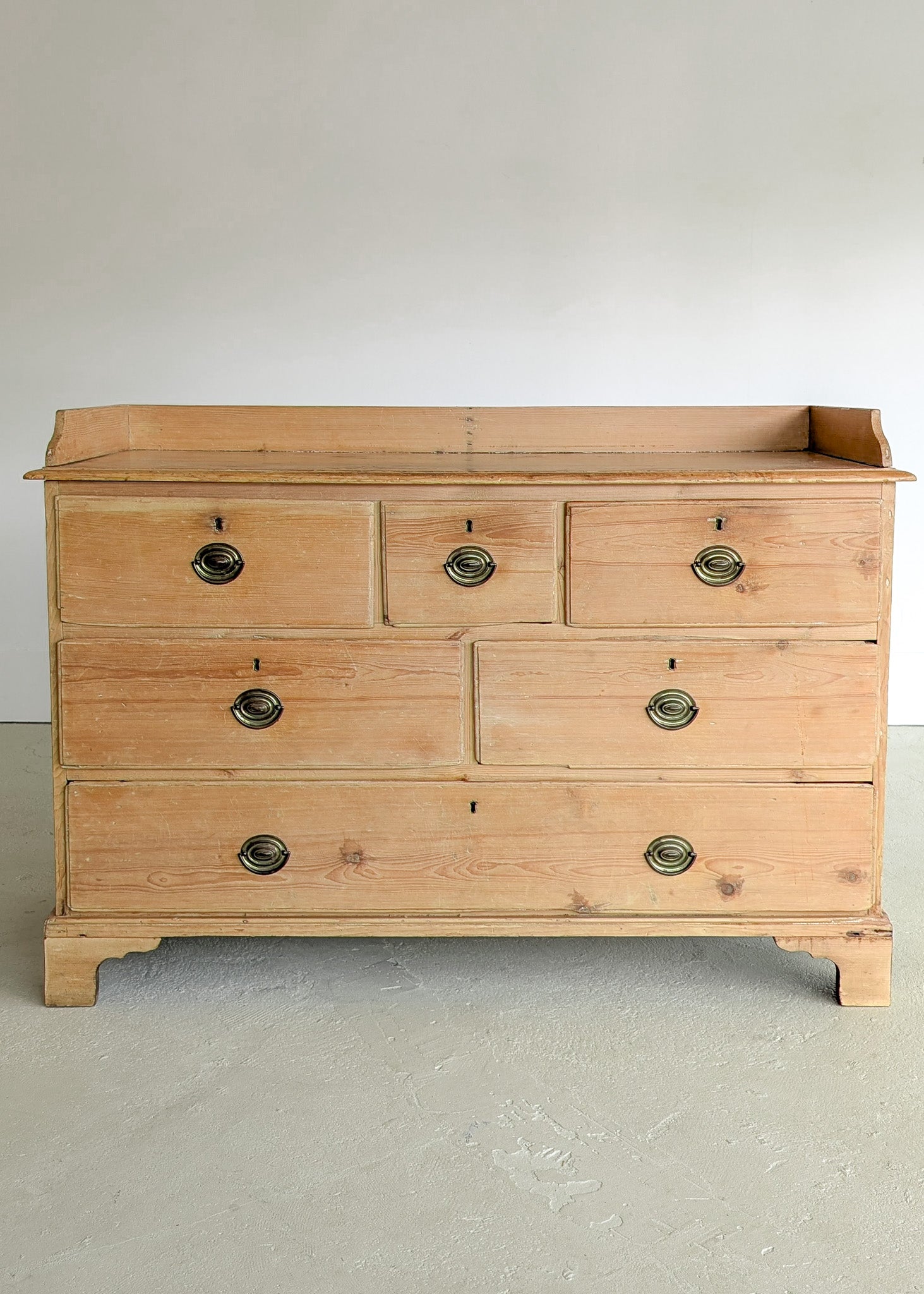 Wide Antique English Pine Chest of Drawers with Trim Top