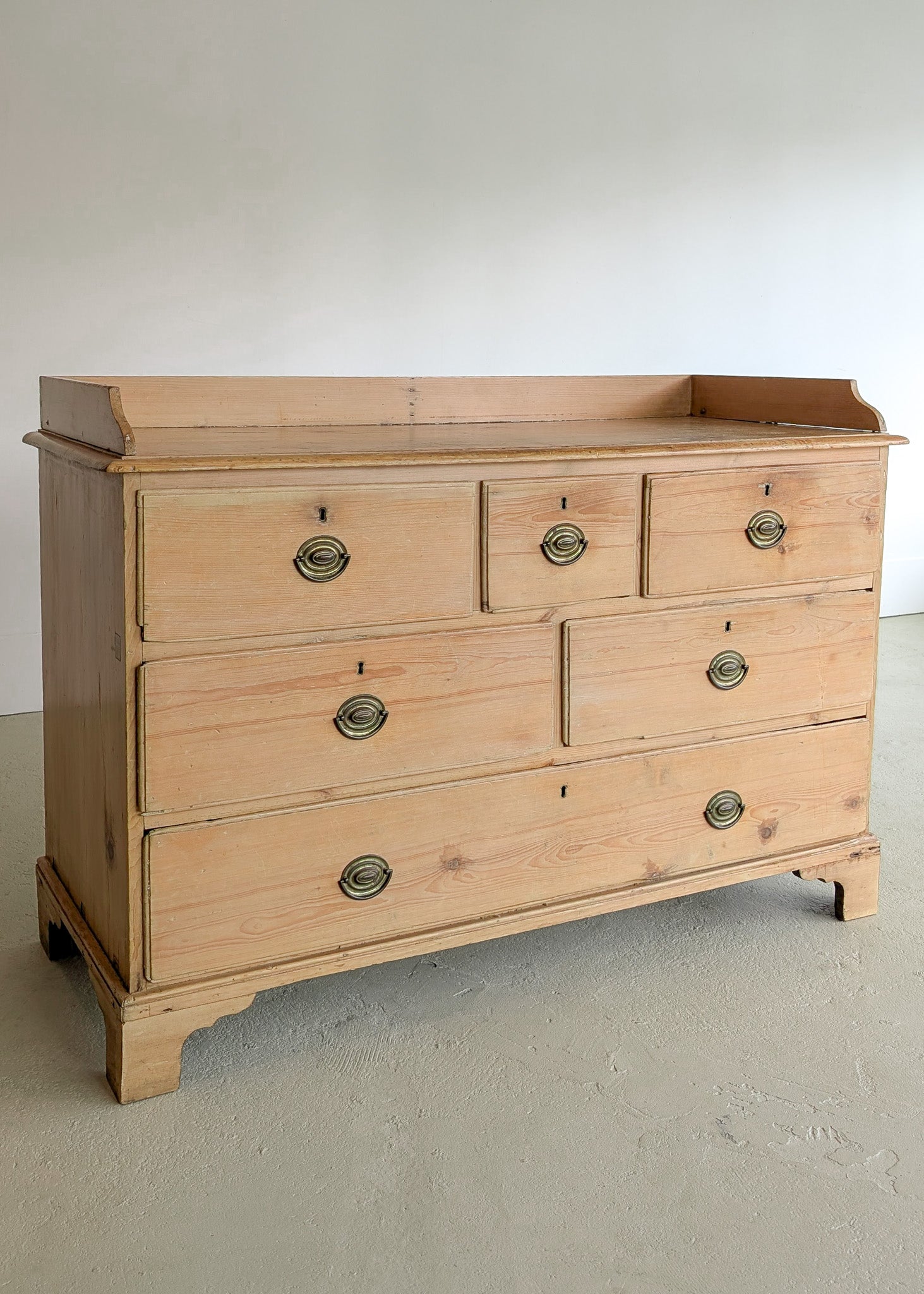 Wide Antique English Pine Chest of Drawers with Trim Top