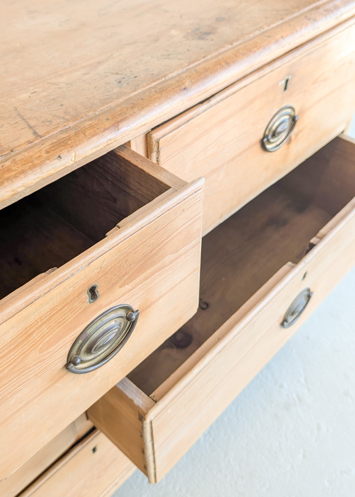 Wide Antique English Pine Chest of Drawers with Trim Top
