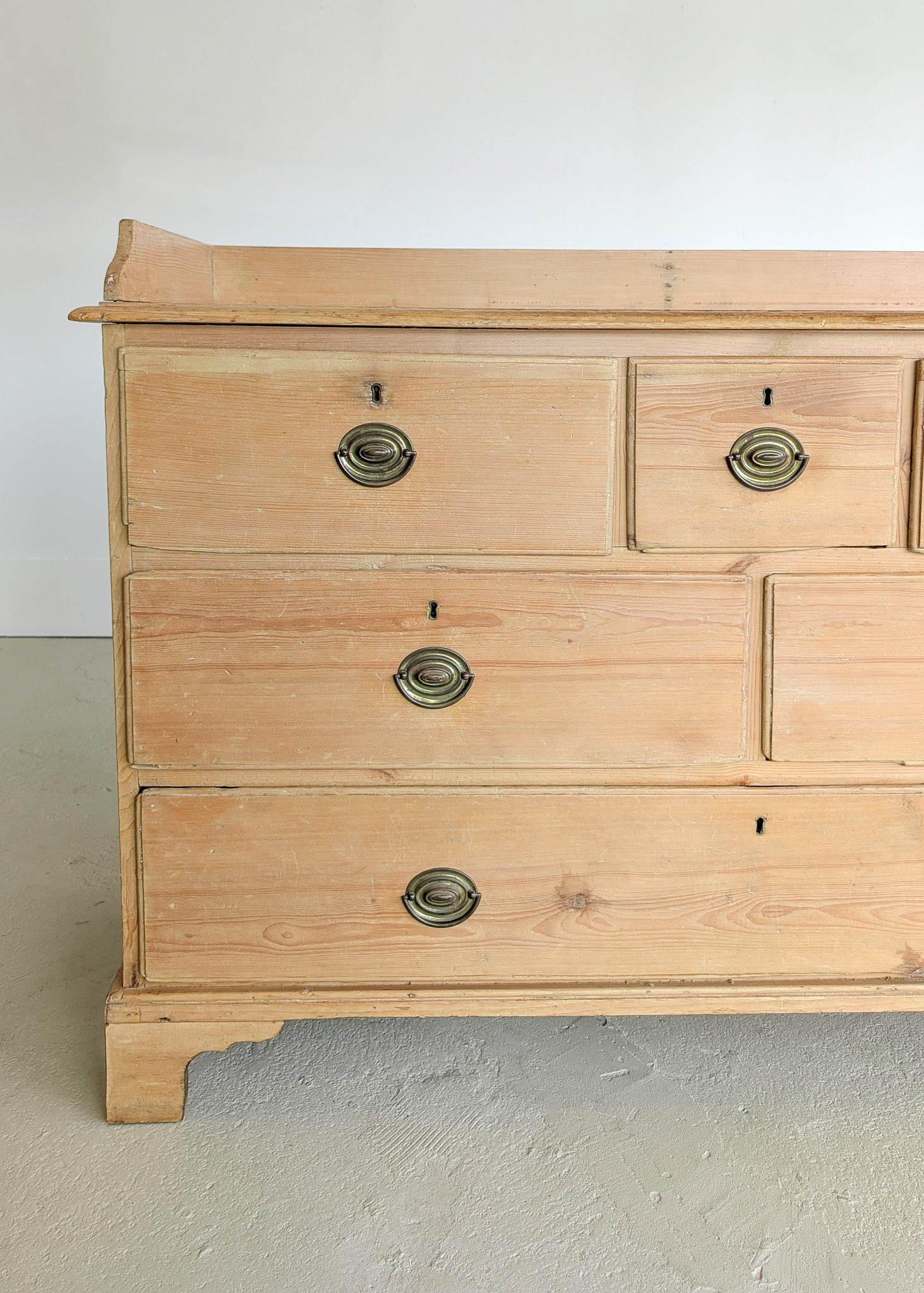 Wide Antique English Pine Chest of Drawers with Trim Top