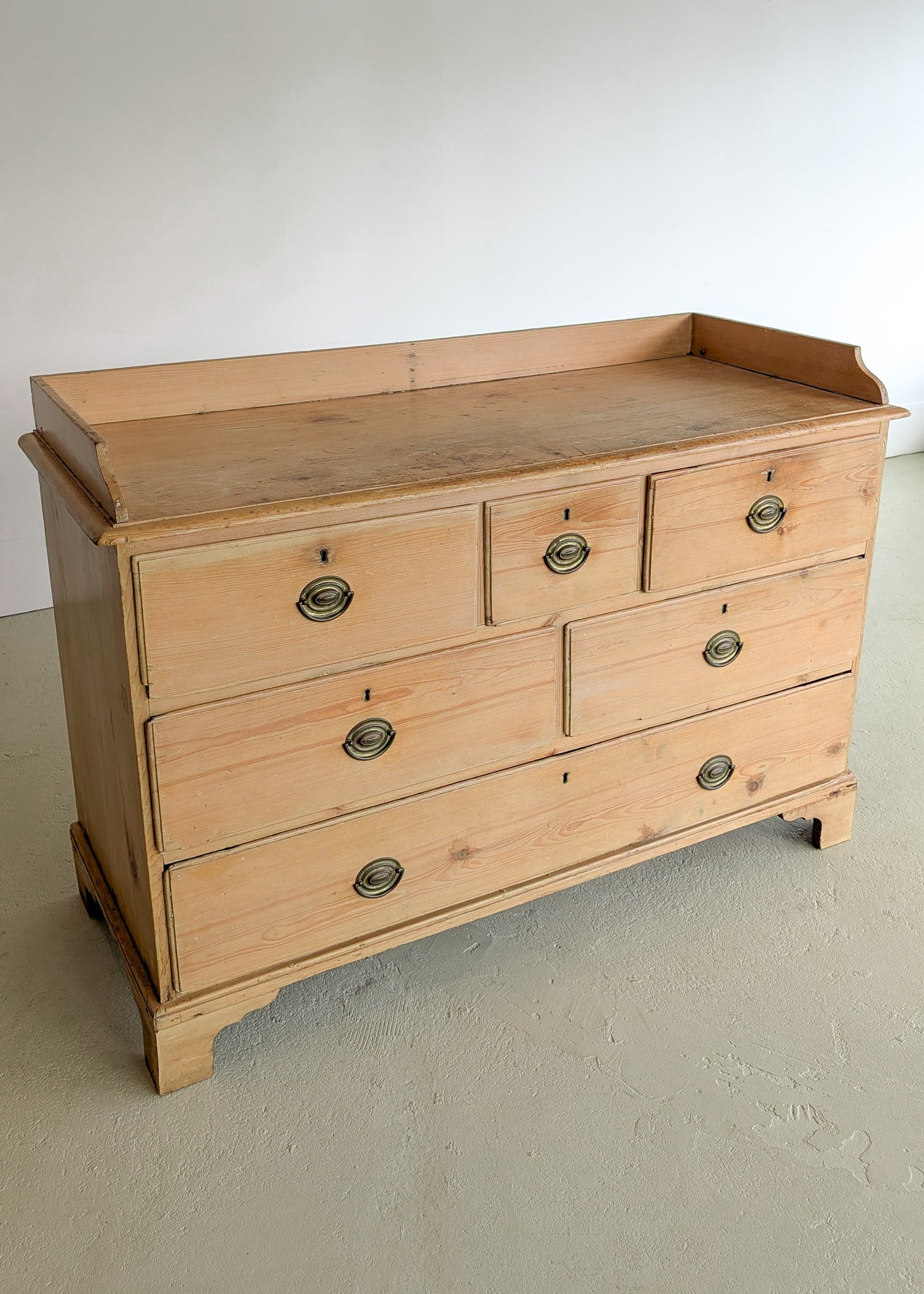 Wide Antique English Pine Chest of Drawers with Trim Top