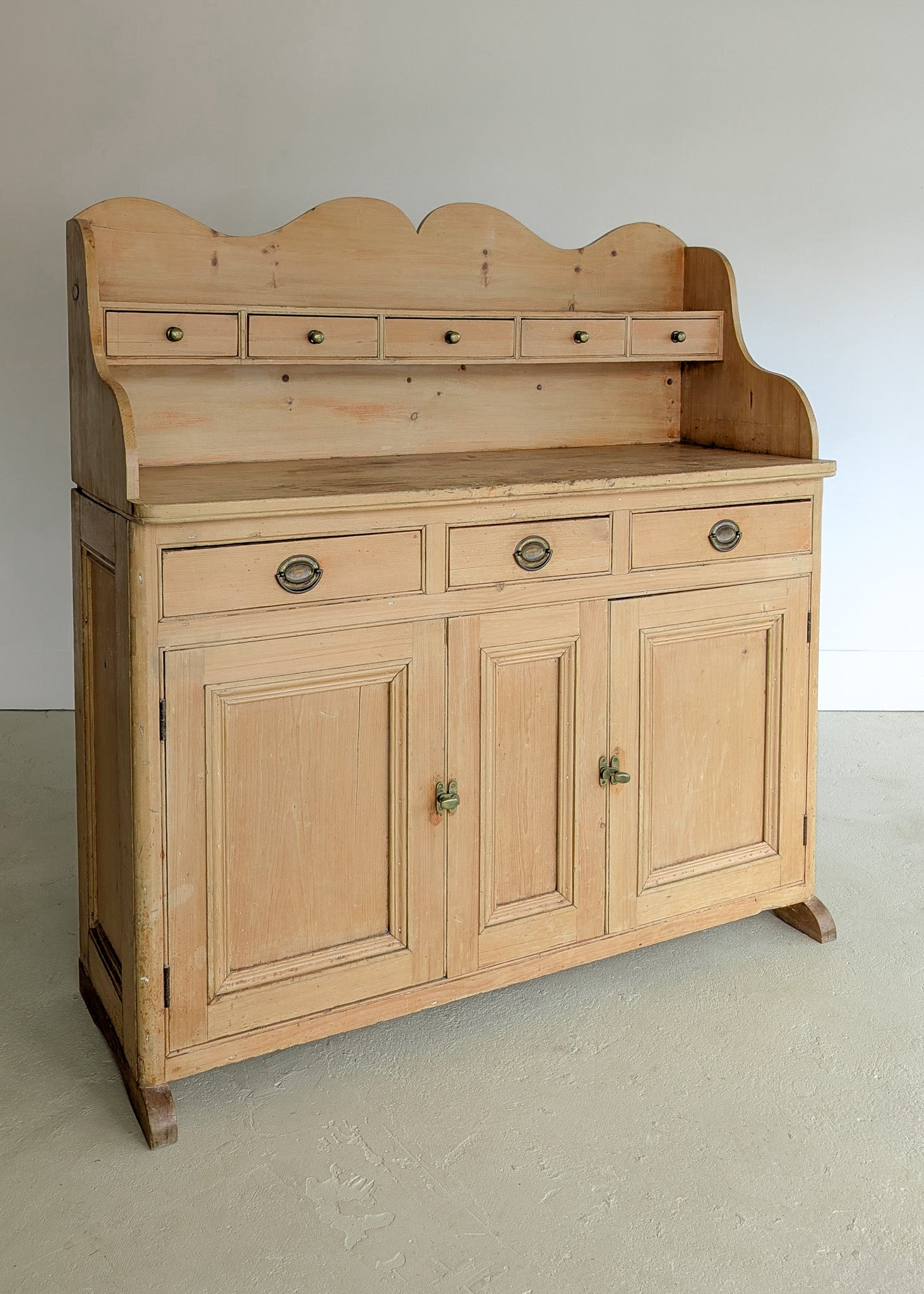 Antique English Pine Scalloped Step Back Buffet with Brass Hardware