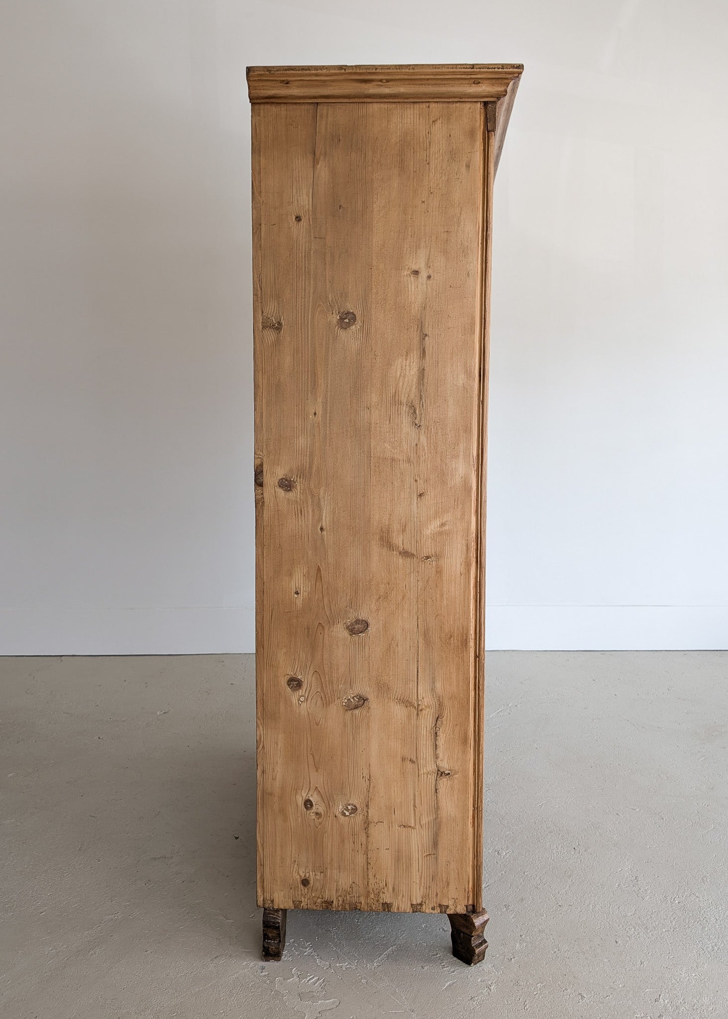 Handsome Antique European Pine Cabinet with Arched Panel Doors, Carved Feet and Skeleton Key