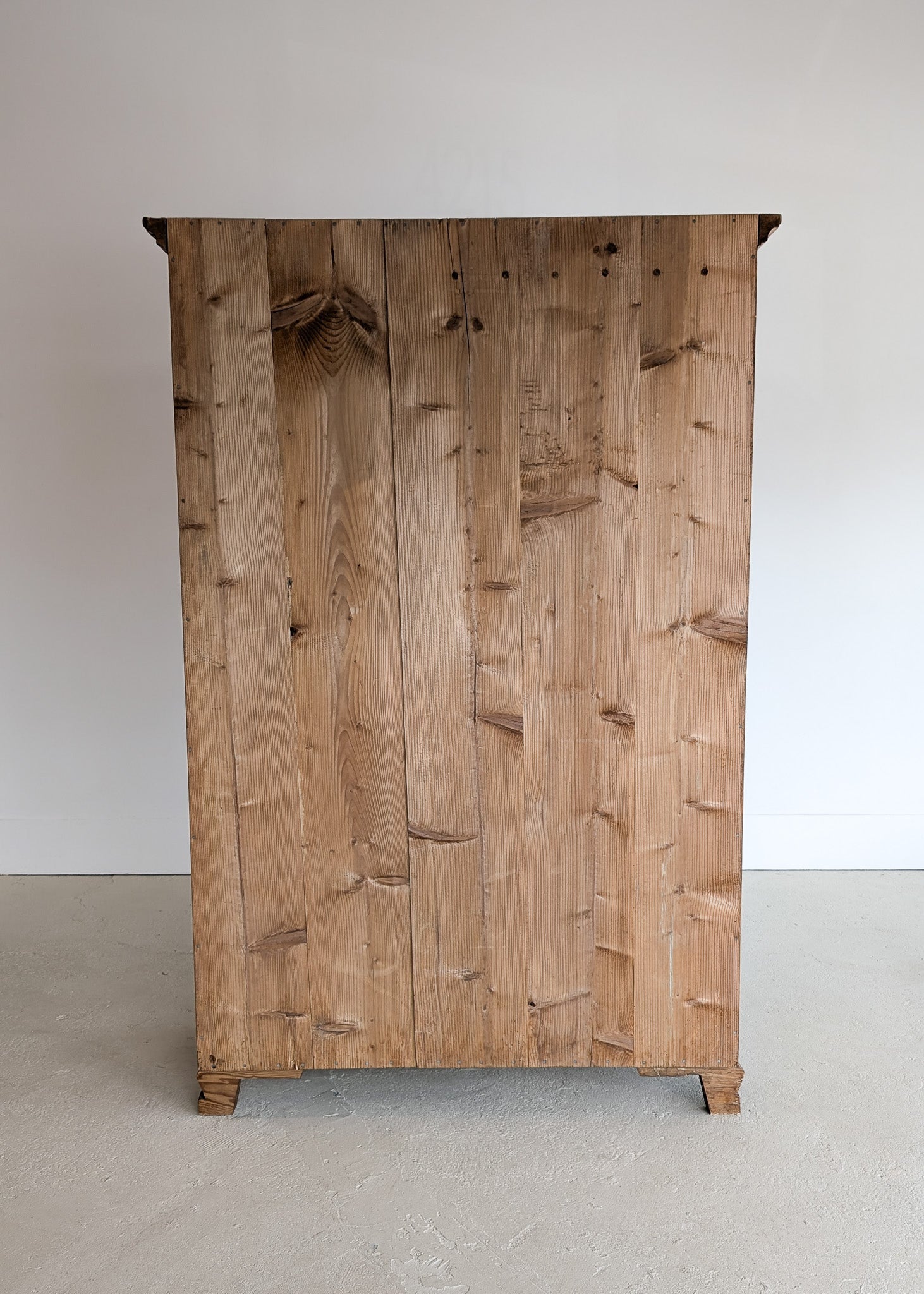 Handsome Antique European Pine Cabinet with Arched Panel Doors, Carved Feet and Skeleton Key