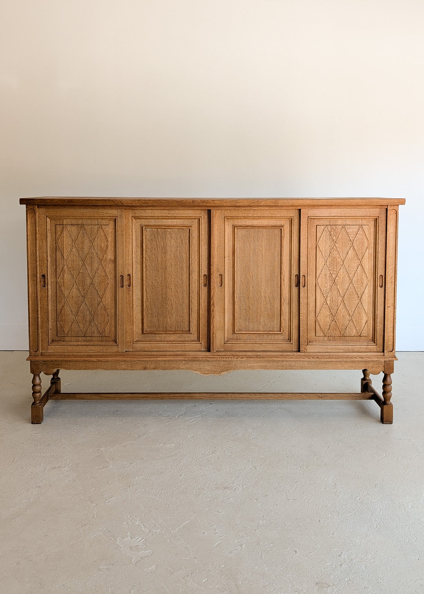 Vintage Midcentury Danish Henning Kjærnulf-Attributed Tall Oak Sideboard Cabinet with Carved Sliding Doors
