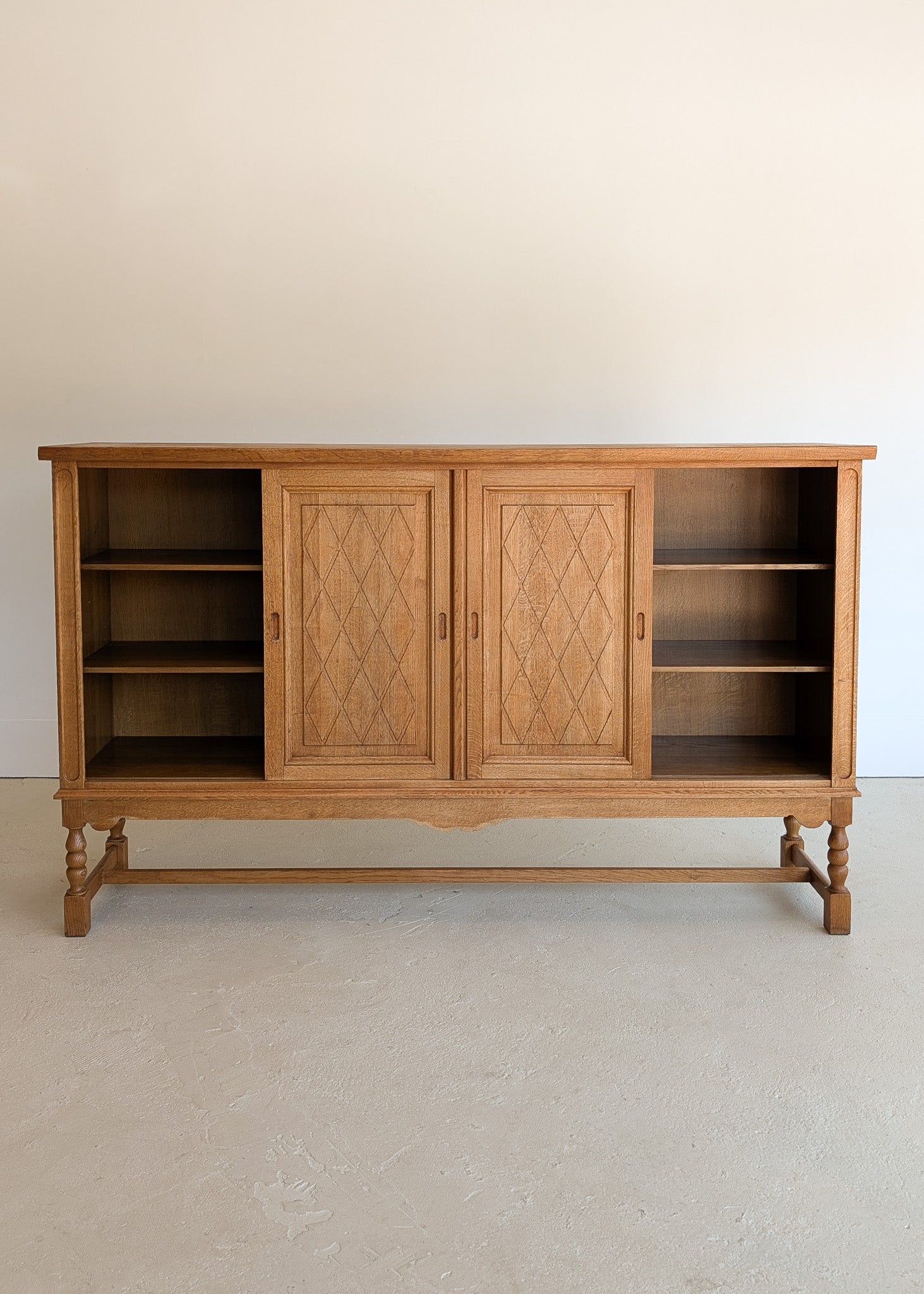 Vintage Midcentury Danish Henning Kjærnulf-Attributed Tall Oak Sideboard Cabinet with Carved Sliding Doors