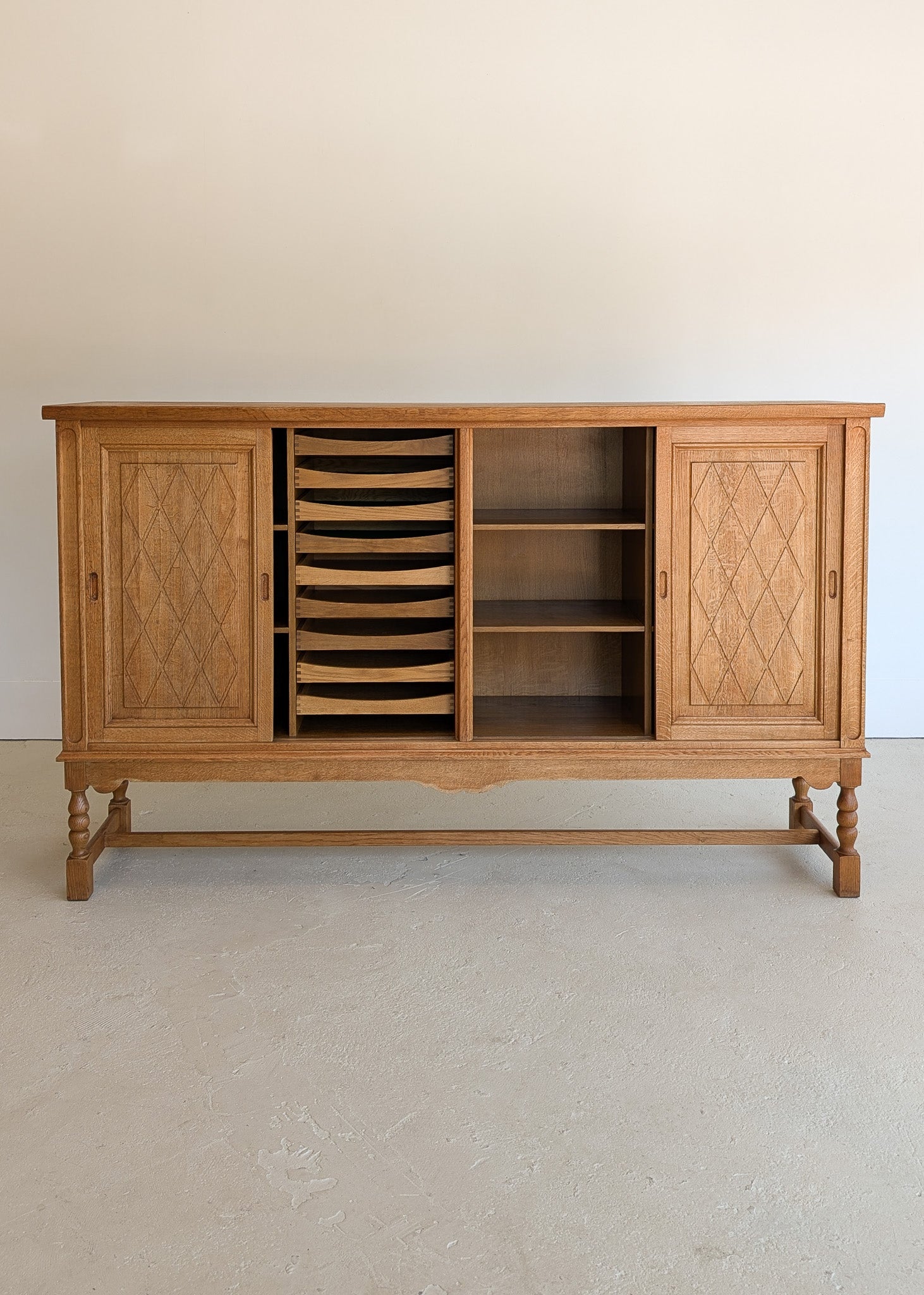 Vintage Midcentury Danish Henning Kjærnulf-Attributed Tall Oak Sideboard Cabinet with Carved Sliding Doors