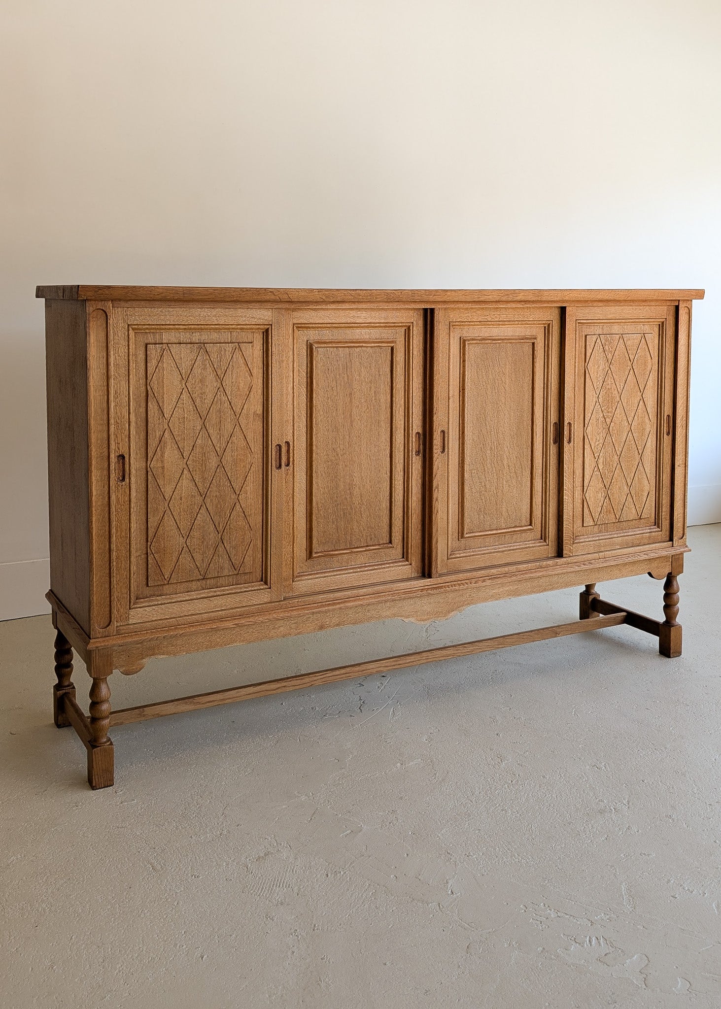 Vintage Midcentury Danish Henning Kjærnulf-Attributed Tall Oak Sideboard Cabinet with Carved Sliding Doors