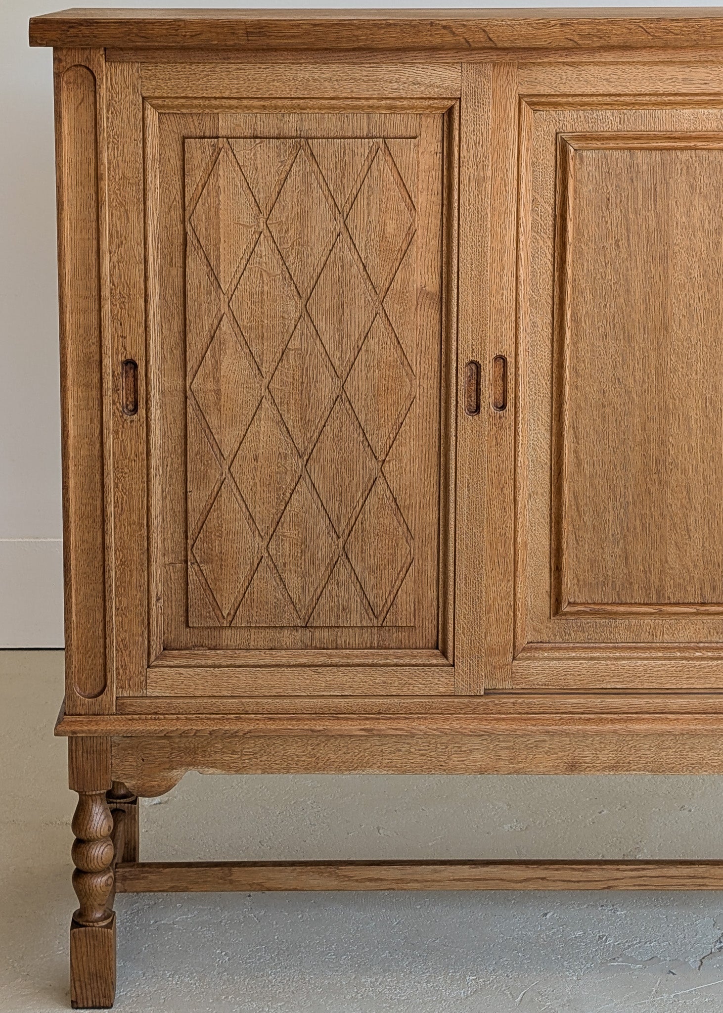 Vintage Midcentury Danish Henning Kjærnulf-Attributed Tall Oak Sideboard Cabinet with Carved Sliding Doors
