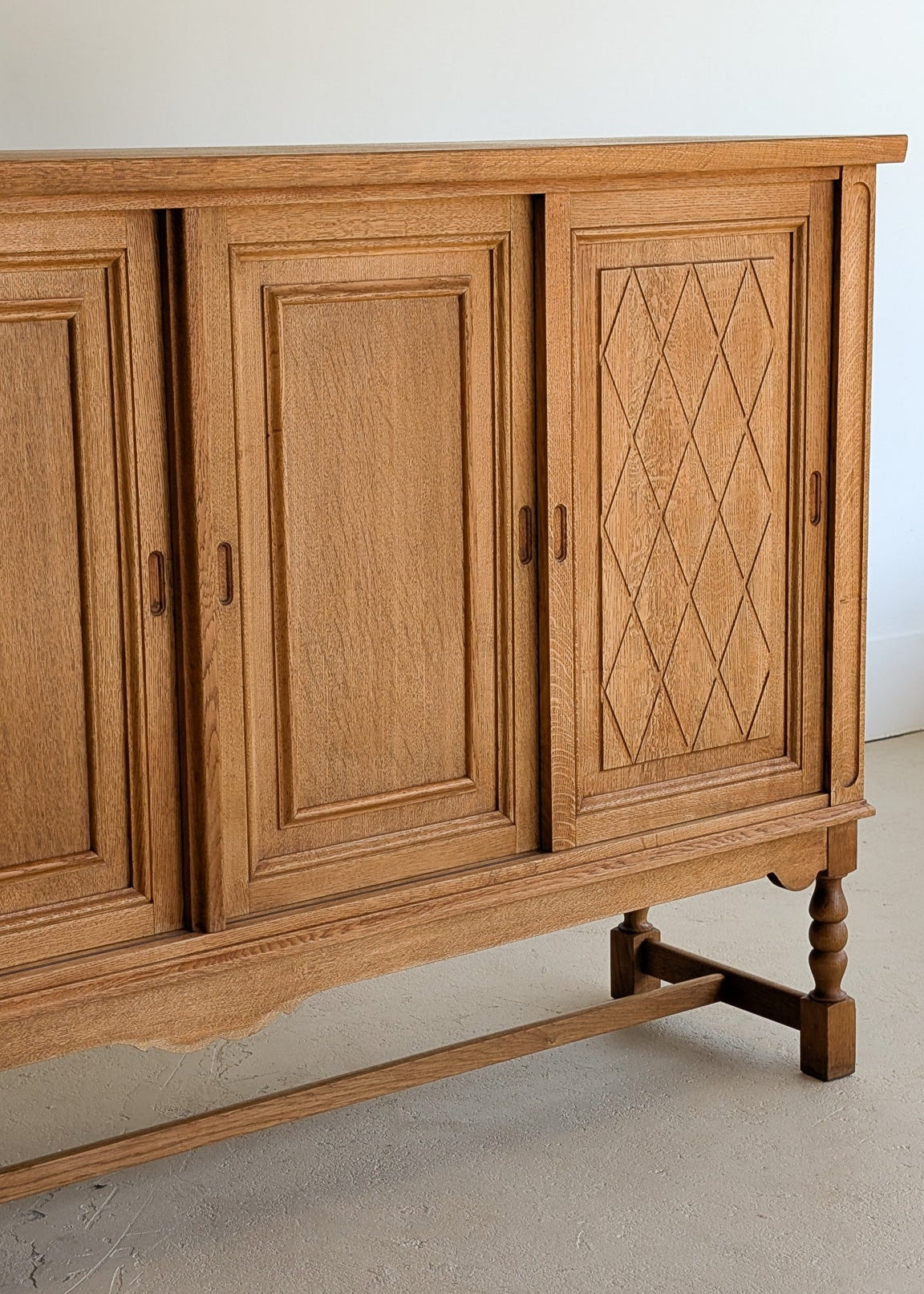 Vintage Midcentury Danish Henning Kjærnulf-Attributed Tall Oak Sideboard Cabinet with Carved Sliding Doors