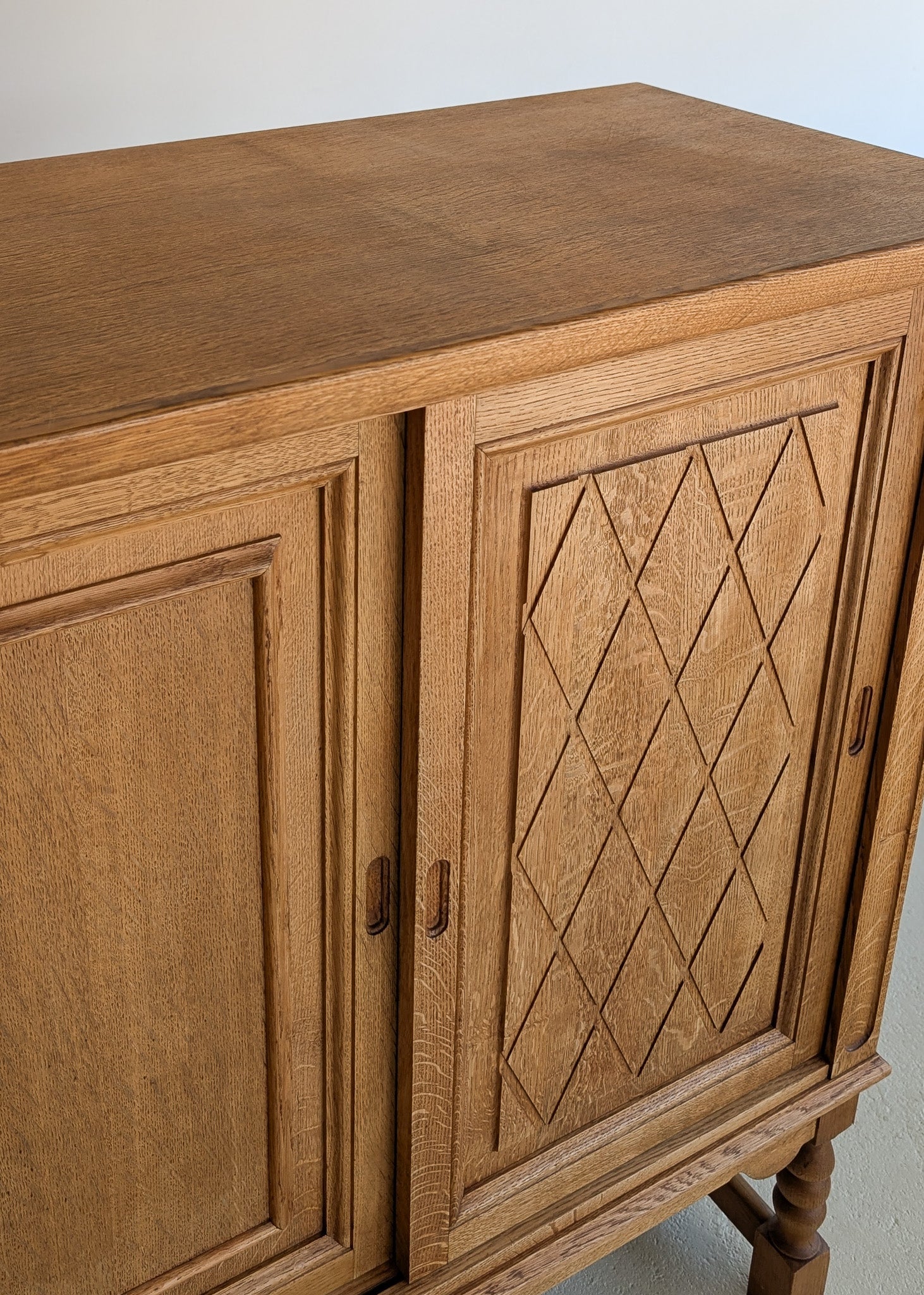 Vintage Midcentury Danish Henning Kjærnulf-Attributed Tall Oak Sideboard Cabinet with Carved Sliding Doors