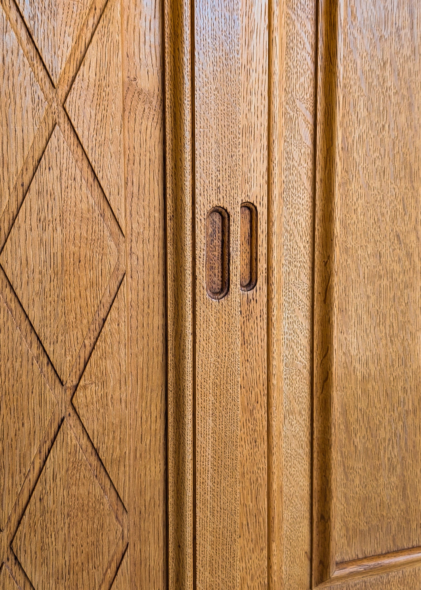 Vintage Midcentury Danish Henning Kjærnulf-Attributed Tall Oak Sideboard Cabinet with Carved Sliding Doors