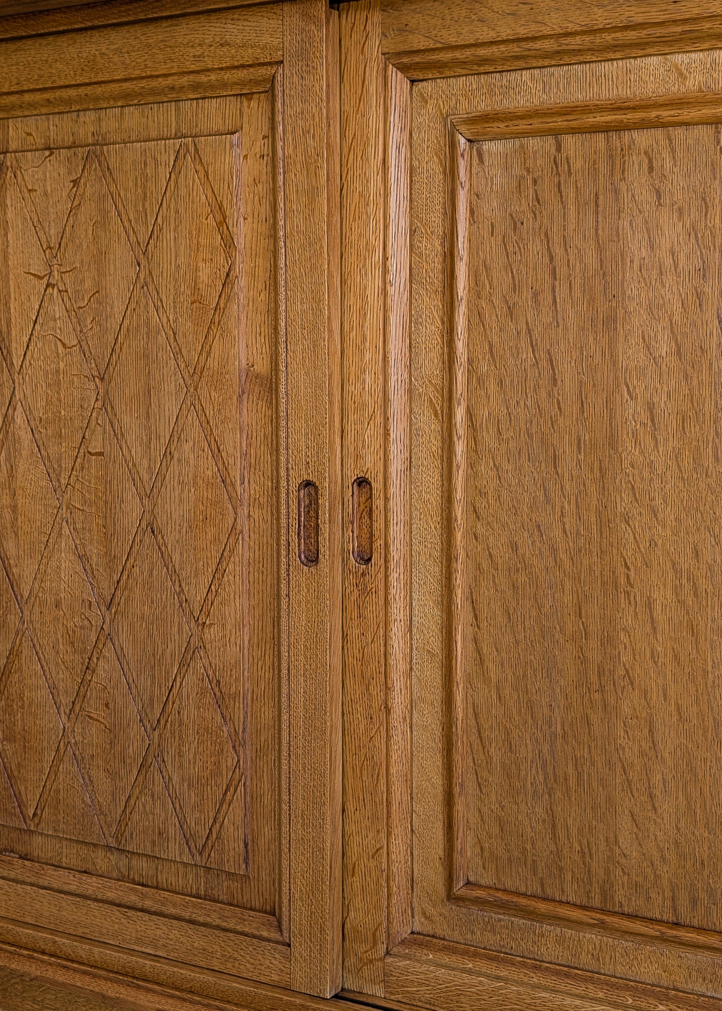 Vintage Midcentury Danish Henning Kjærnulf-Attributed Tall Oak Sideboard Cabinet with Carved Sliding Doors