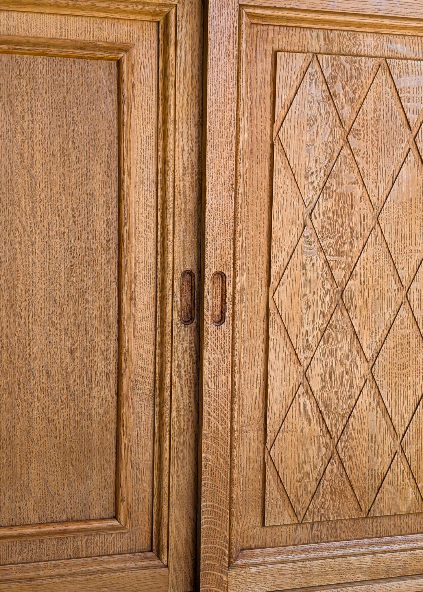 Vintage Midcentury Danish Henning Kjærnulf-Attributed Tall Oak Sideboard Cabinet with Carved Sliding Doors