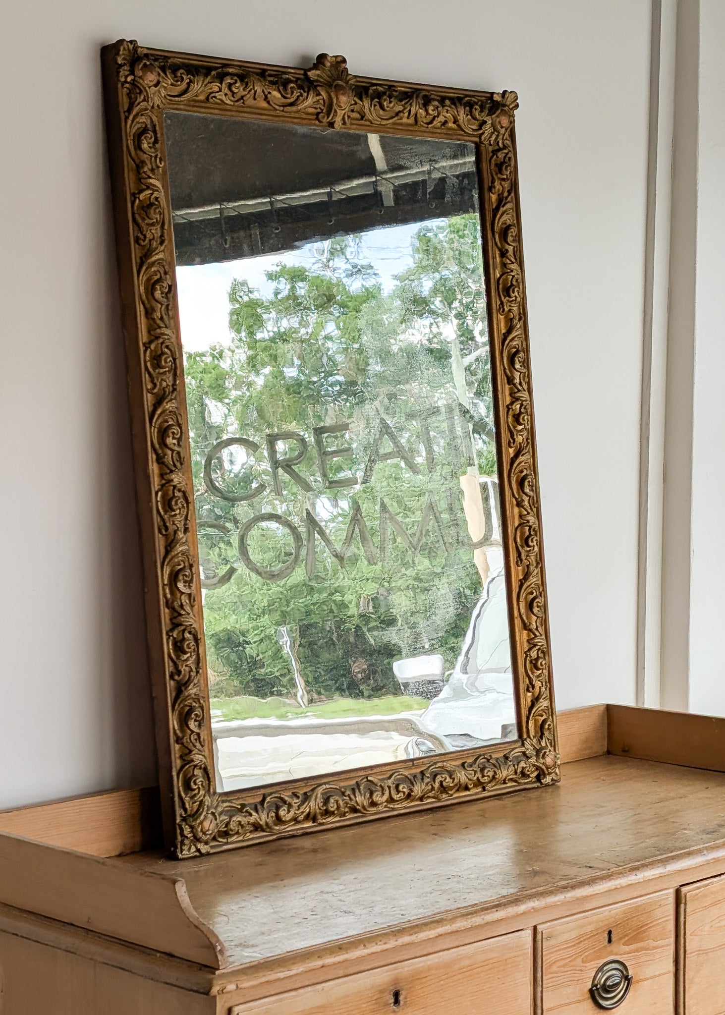 Large Antique Gilded Plaster and Wood Mirror with Wavy Glass