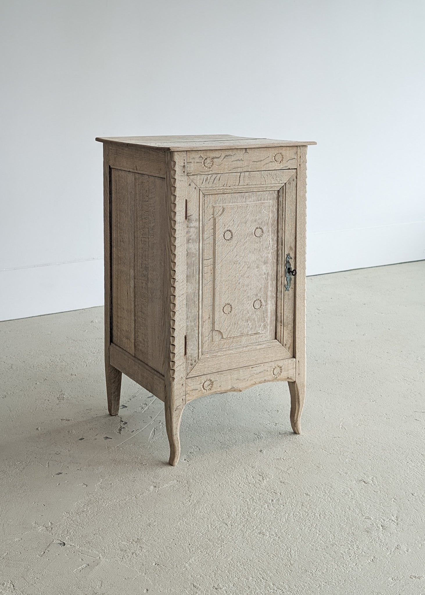 Antique European Bleached Oak Cabinet or Side Table with Hand-Carved Floral Detailing and Original Key