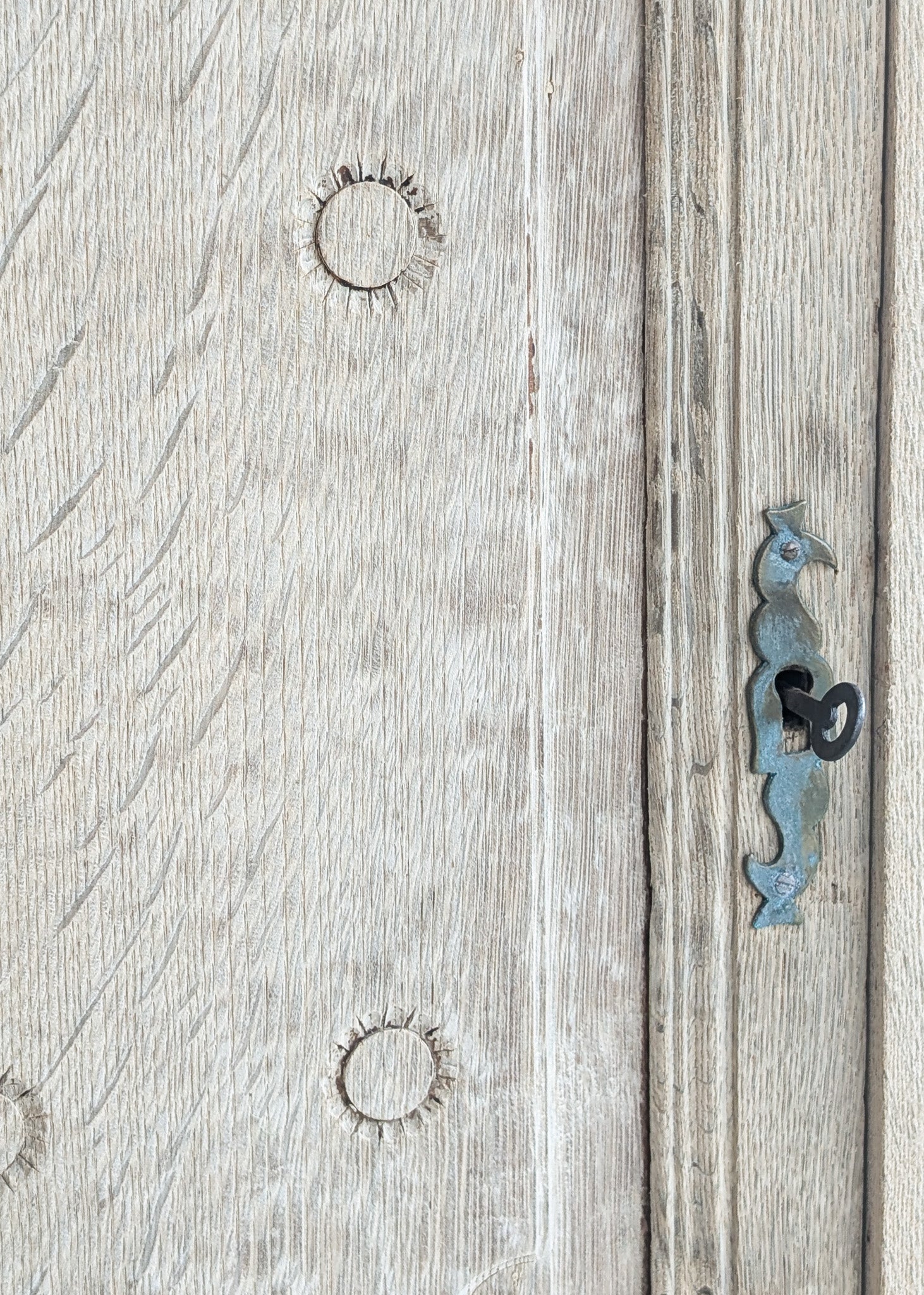 Antique European Bleached Oak Cabinet or Side Table with Hand-Carved Floral Detailing and Original Key