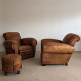 Pair of Vintage 1970s French Leather Club Chairs and Matching Leather Hassock