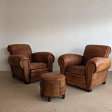 Pair of Vintage 1970s French Leather Club Chairs and Matching Leather Hassock