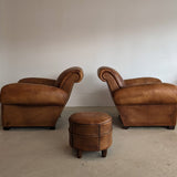 Pair of Vintage 1970s French Leather Club Chairs and Matching Leather Hassock