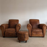 Pair of Vintage 1970s French Leather Club Chairs and Matching Leather Hassock