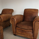 Pair of Vintage 1970s French Leather Club Chairs and Matching Leather Hassock