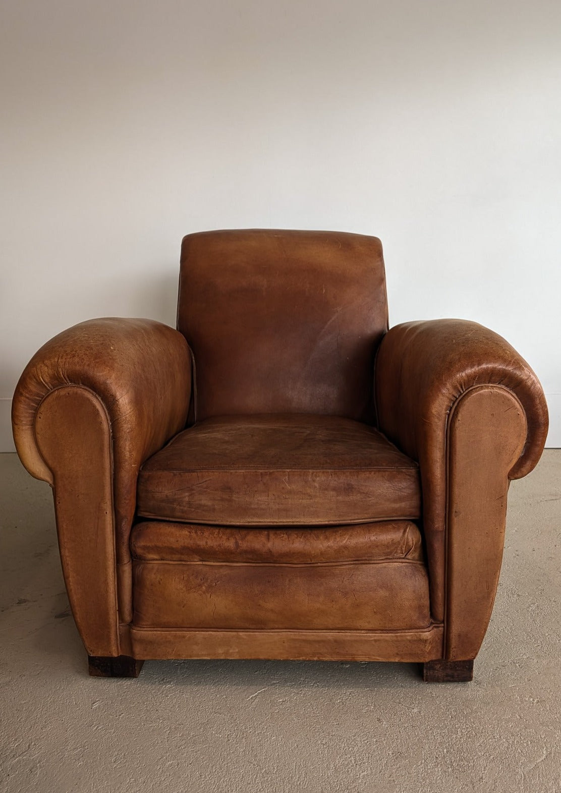 Pair of Vintage 1970s French Leather Club Chairs and Matching Leather Hassock