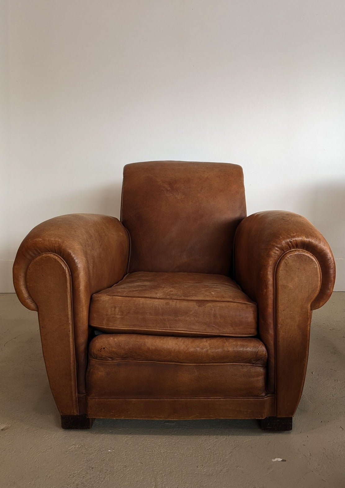 Pair of Vintage 1970s French Leather Club Chairs and Matching Leather Hassock