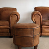 Pair of Vintage 1970s French Leather Club Chairs and Matching Leather Hassock