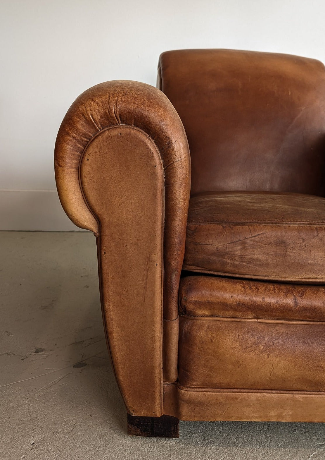 Pair of Vintage 1970s French Leather Club Chairs and Matching Leather Hassock