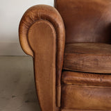 Pair of Vintage 1970s French Leather Club Chairs and Matching Leather Hassock