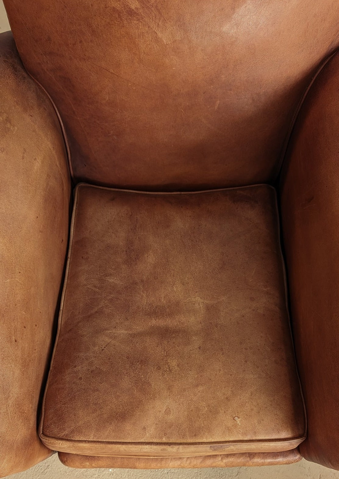 Pair of Vintage 1970s French Leather Club Chairs and Matching Leather Hassock