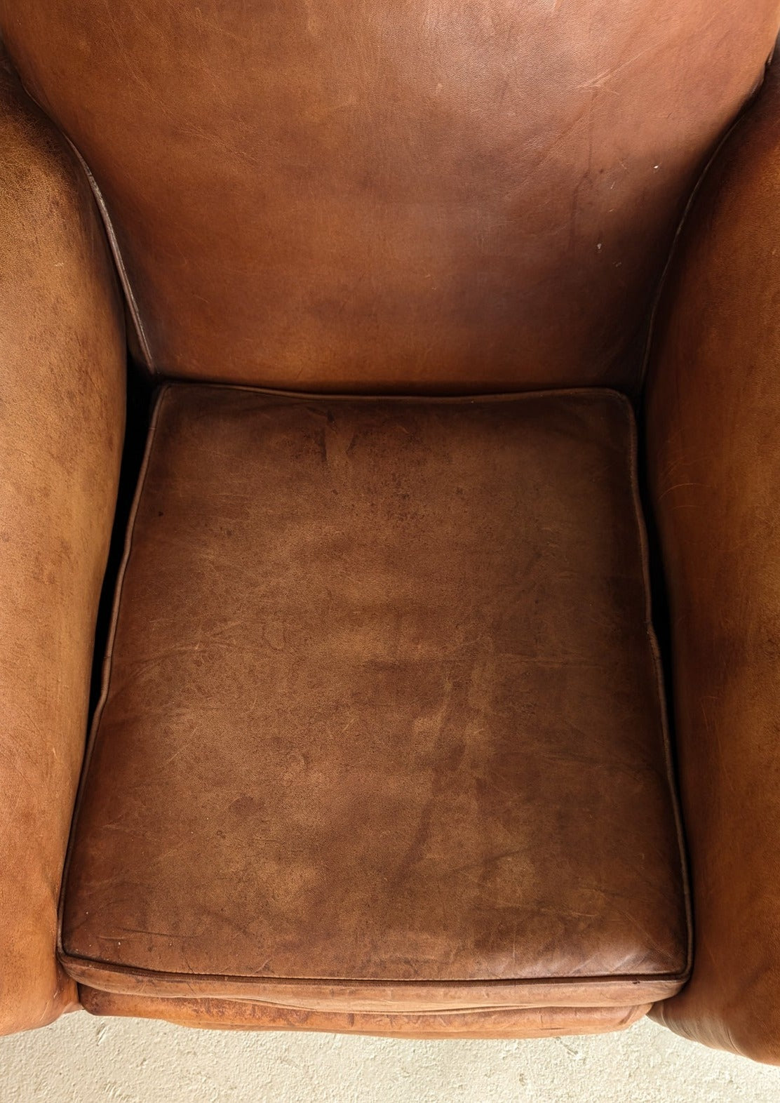 Pair of Vintage 1970s French Leather Club Chairs and Matching Leather Hassock