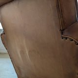 Pair of Vintage 1970s French Leather Club Chairs and Matching Leather Hassock