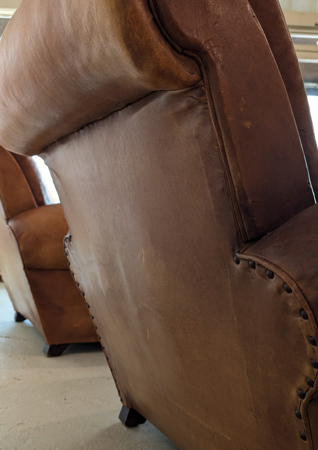 Pair of Vintage 1970s French Leather Club Chairs and Matching Leather Hassock