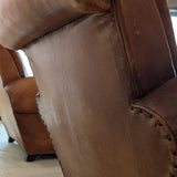 Pair of Vintage 1970s French Leather Club Chairs and Matching Leather Hassock