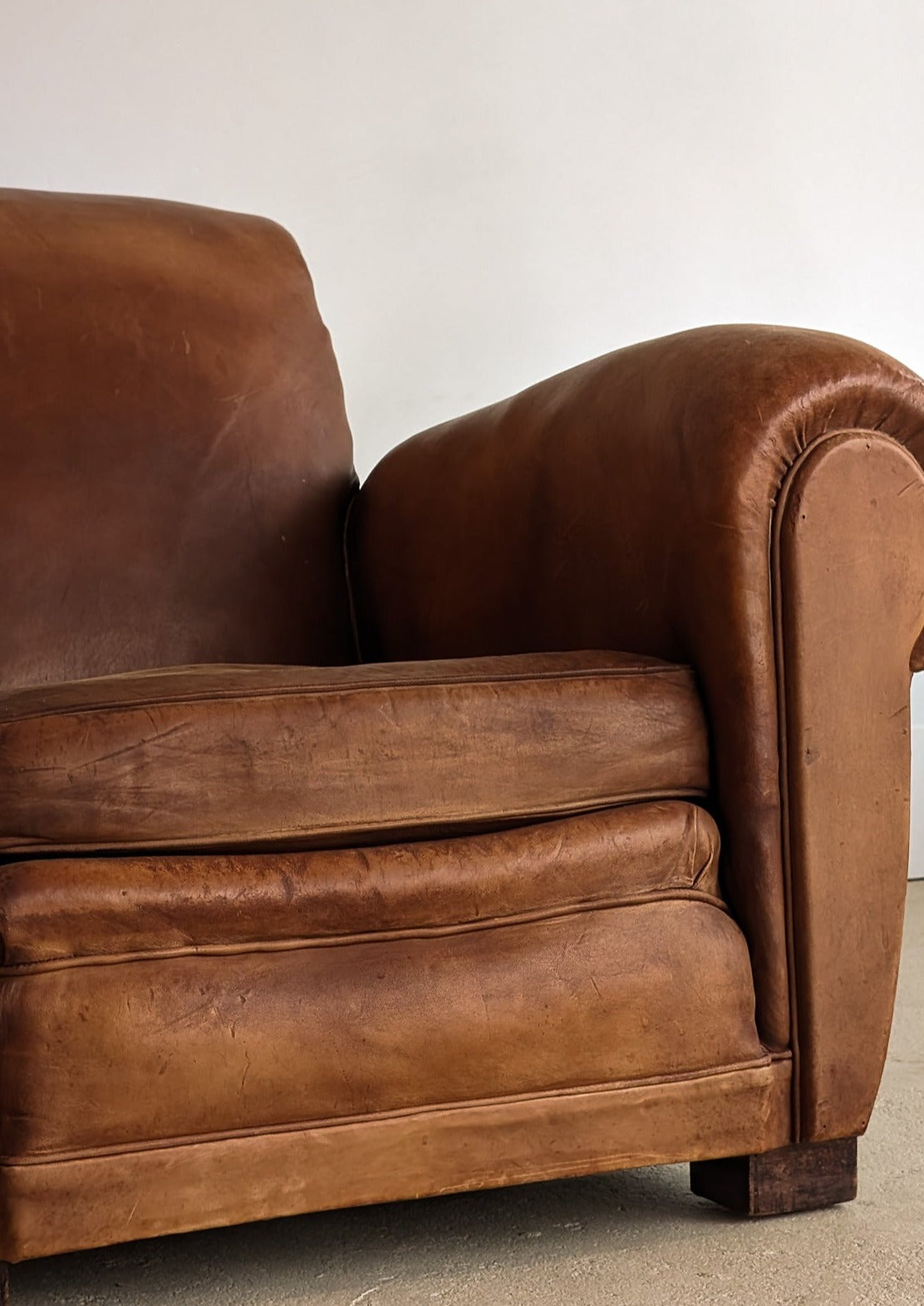 Pair of Vintage 1970s French Leather Club Chairs and Matching Leather Hassock