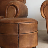 Pair of Vintage 1970s French Leather Club Chairs and Matching Leather Hassock