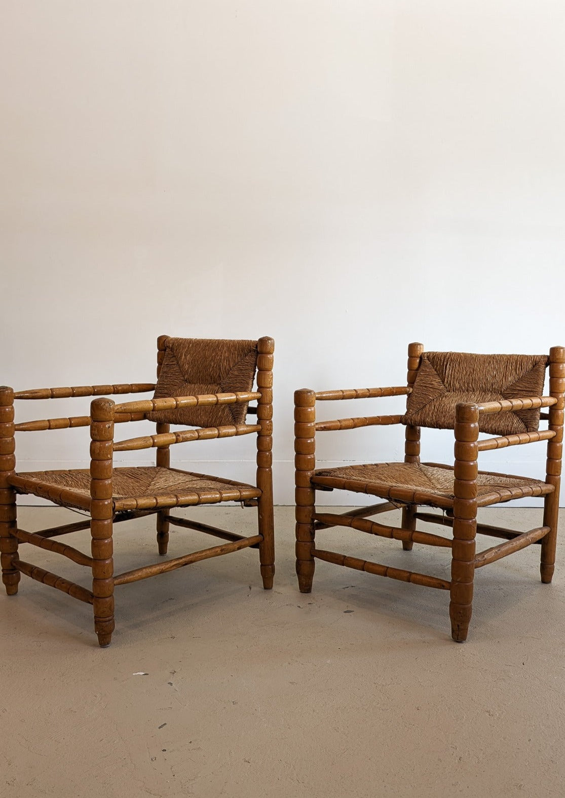Pair of Vintage Midcentury European Charles Dudouyt-Style Hand-turned Rush and Wood Chairs