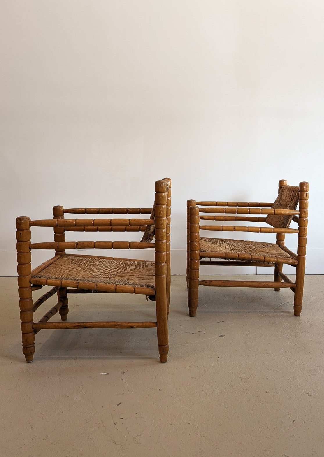 Pair of Vintage Midcentury European Charles Dudouyt-Style Hand-turned Rush and Wood Chairs