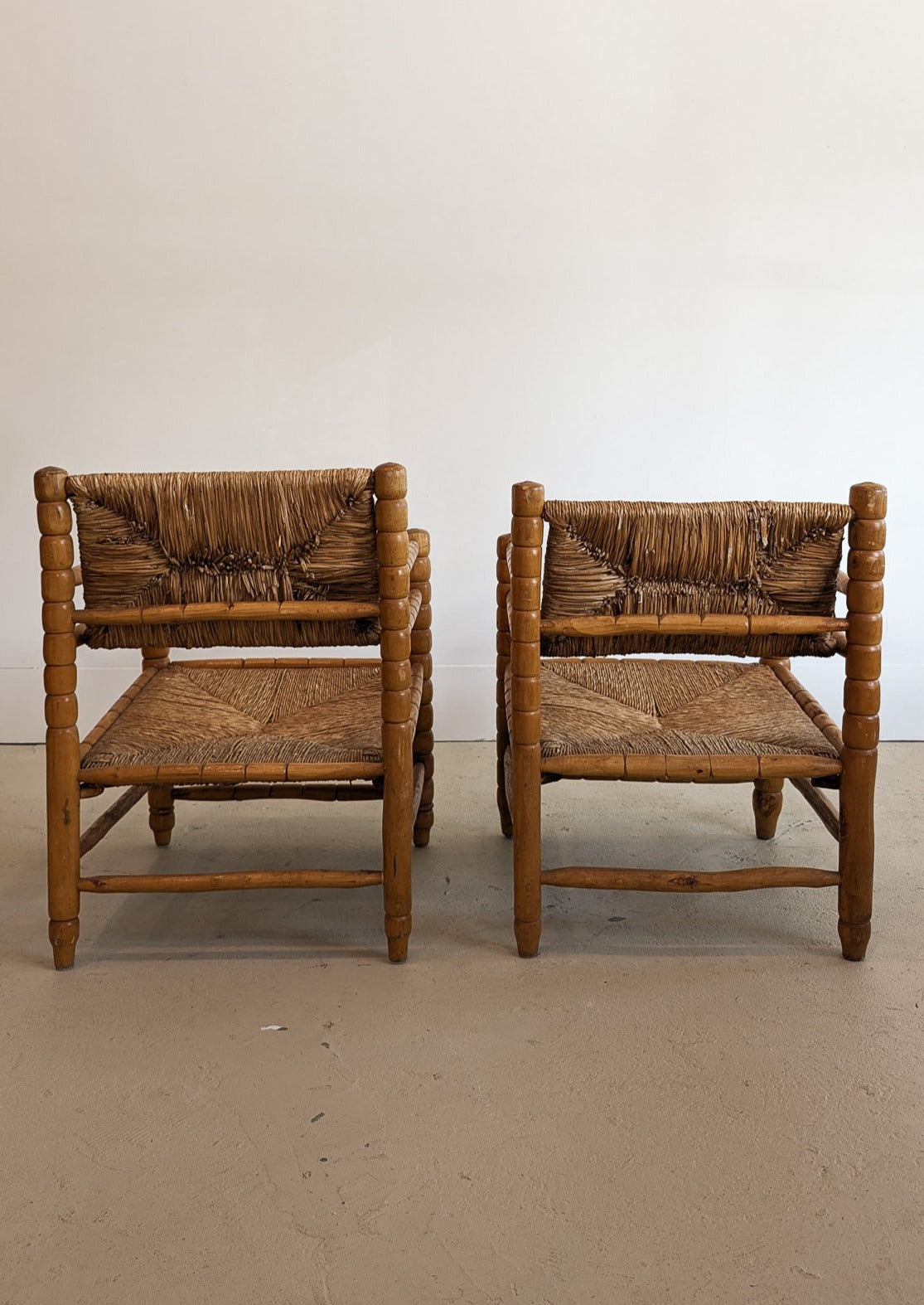 Pair of Vintage Midcentury European Charles Dudouyt-Style Hand-turned Rush and Wood Chairs