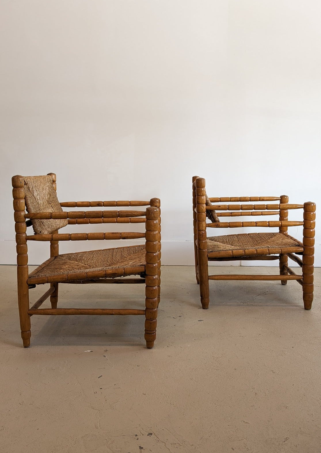 Pair of Vintage Midcentury European Charles Dudouyt-Style Hand-turned Rush and Wood Chairs