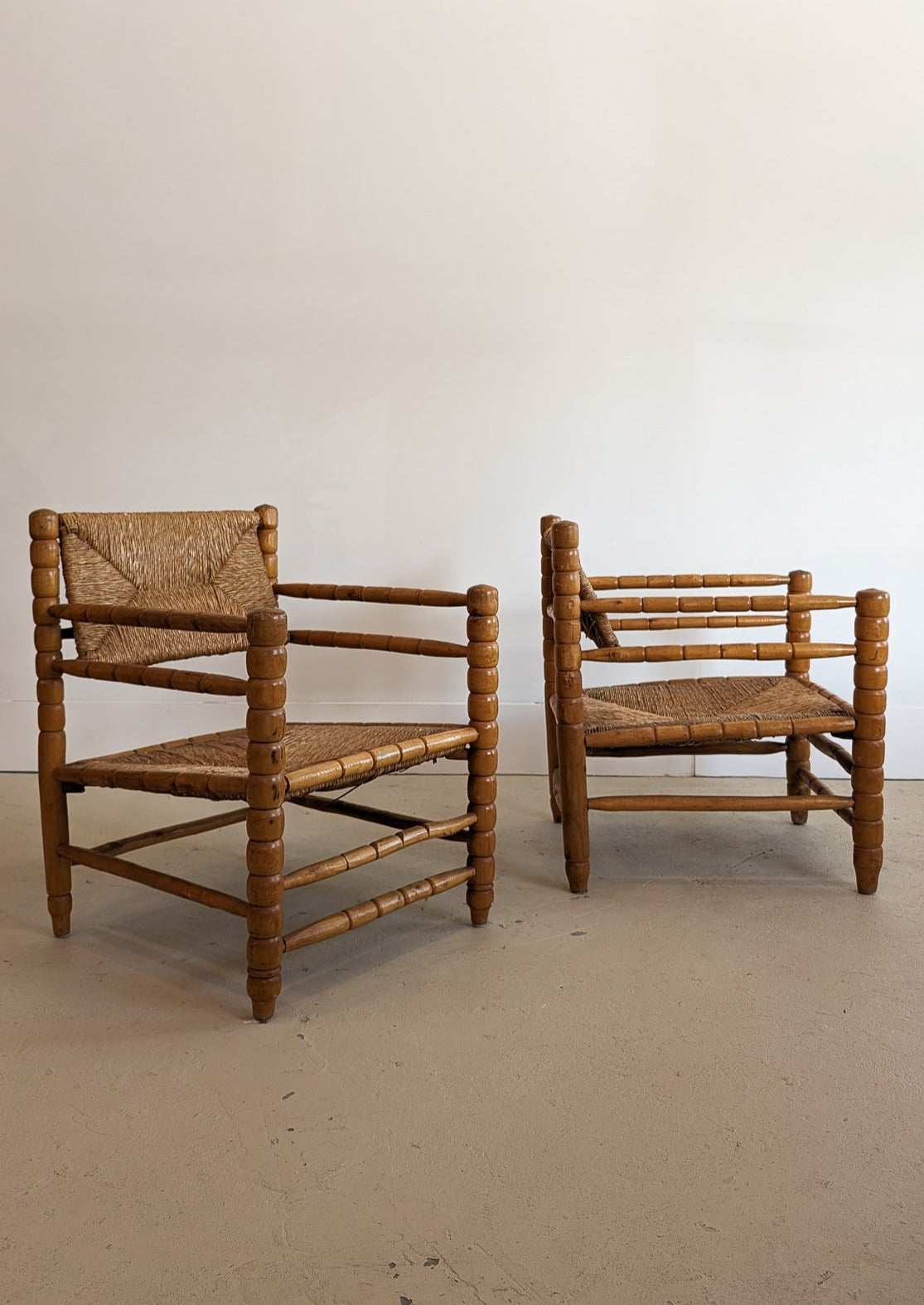 Pair of Vintage Midcentury European Charles Dudouyt-Style Hand-turned Rush and Wood Chairs