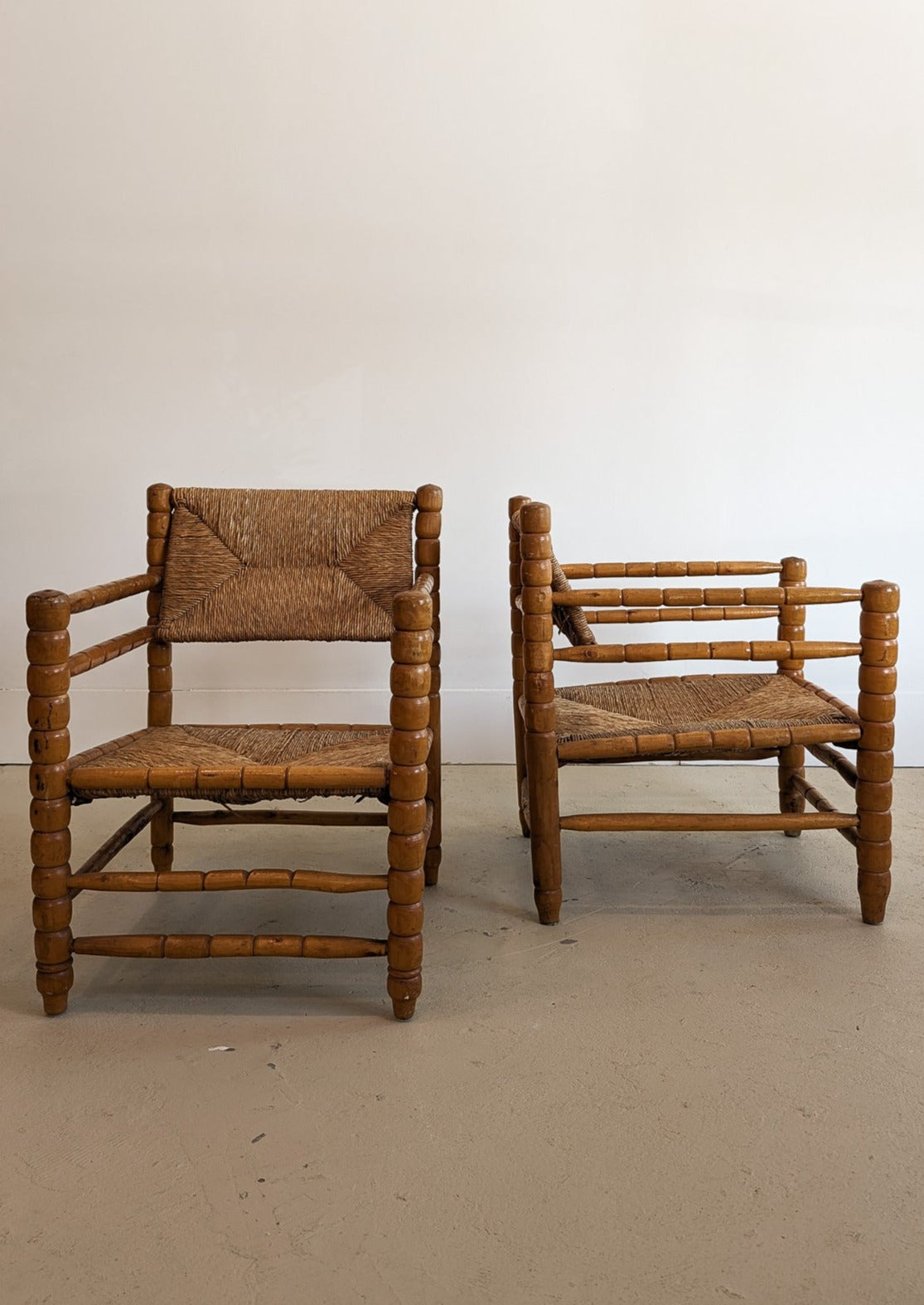 Pair of Vintage Midcentury European Charles Dudouyt-Style Hand-turned Rush and Wood Chairs