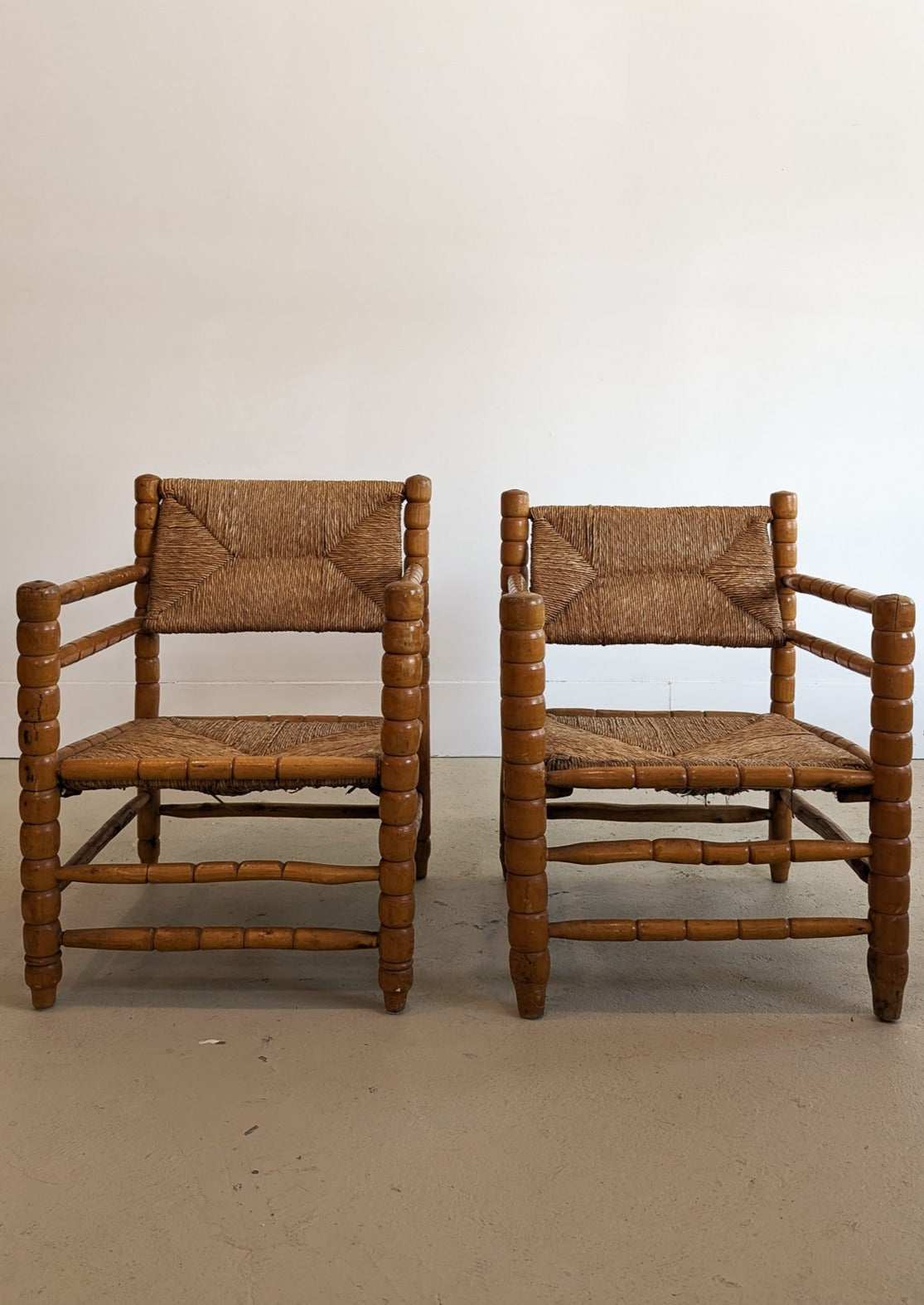 Pair of Vintage Midcentury European Charles Dudouyt-Style Hand-turned Rush and Wood Chairs