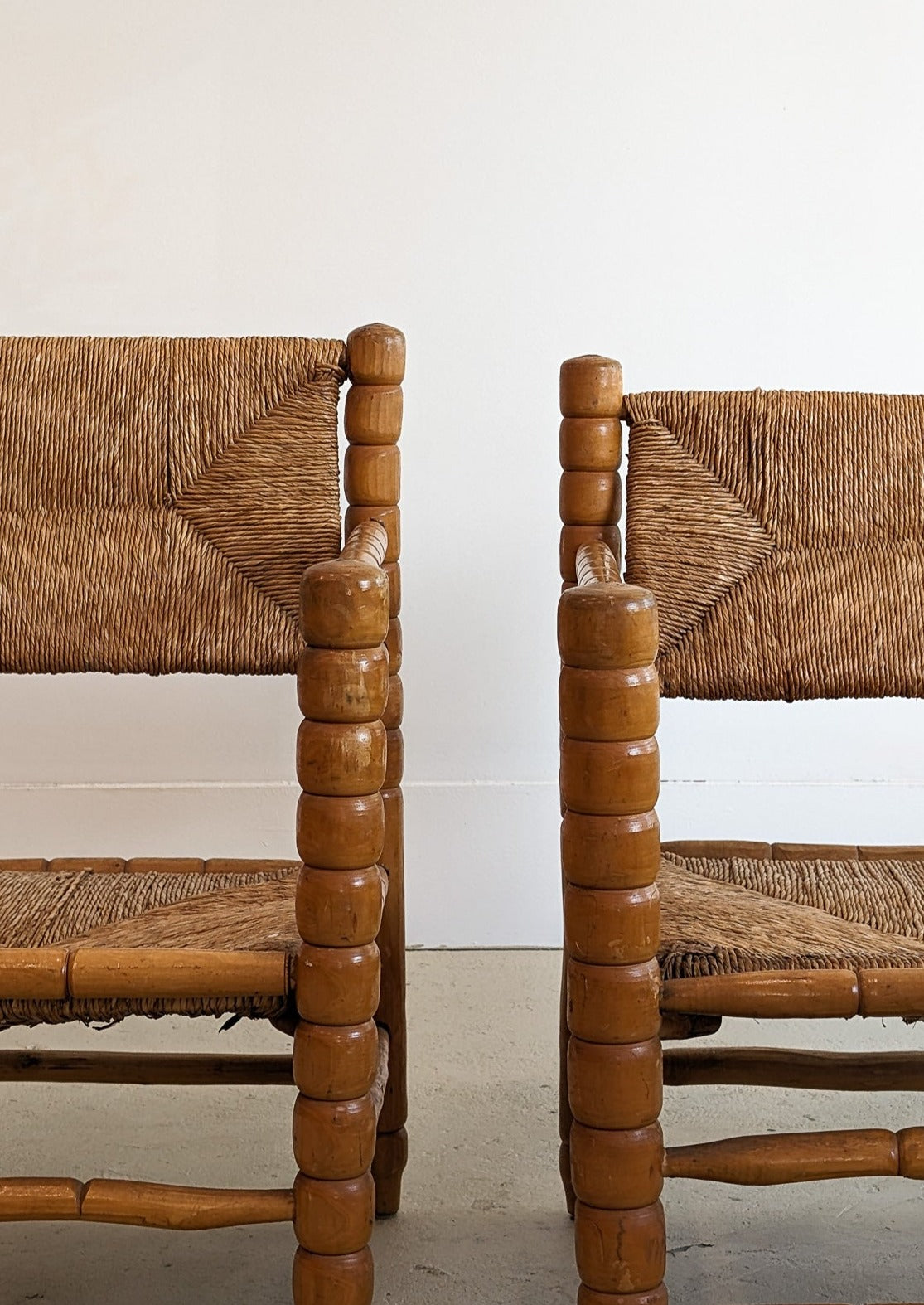 Pair of Vintage Midcentury European Charles Dudouyt-Style Hand-turned Rush and Wood Chairs