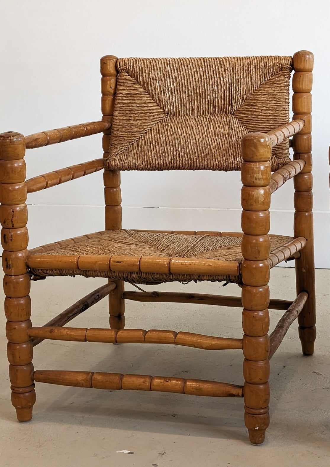 Pair of Vintage Midcentury European Charles Dudouyt-Style Hand-turned Rush and Wood Chairs